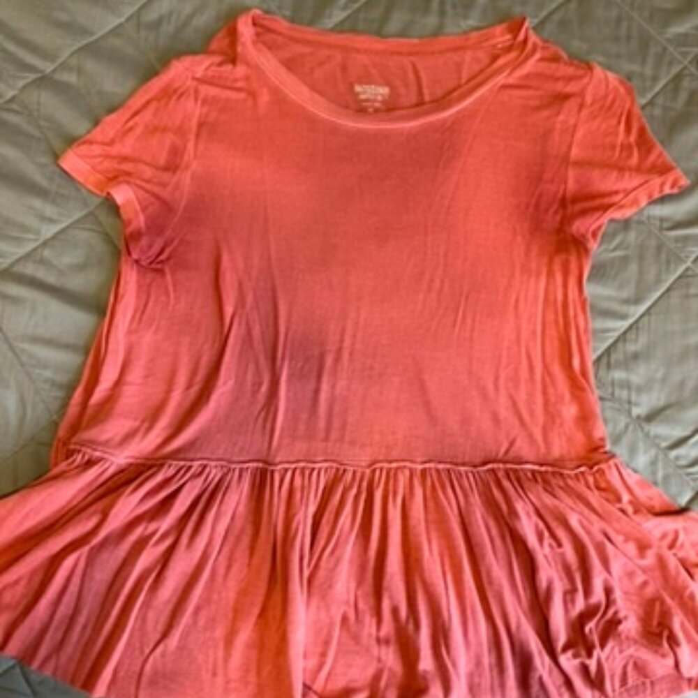 Soft, pink shirt.